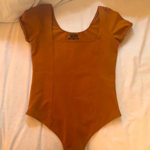 Urban Outfitters Burnt Orange Body Suit